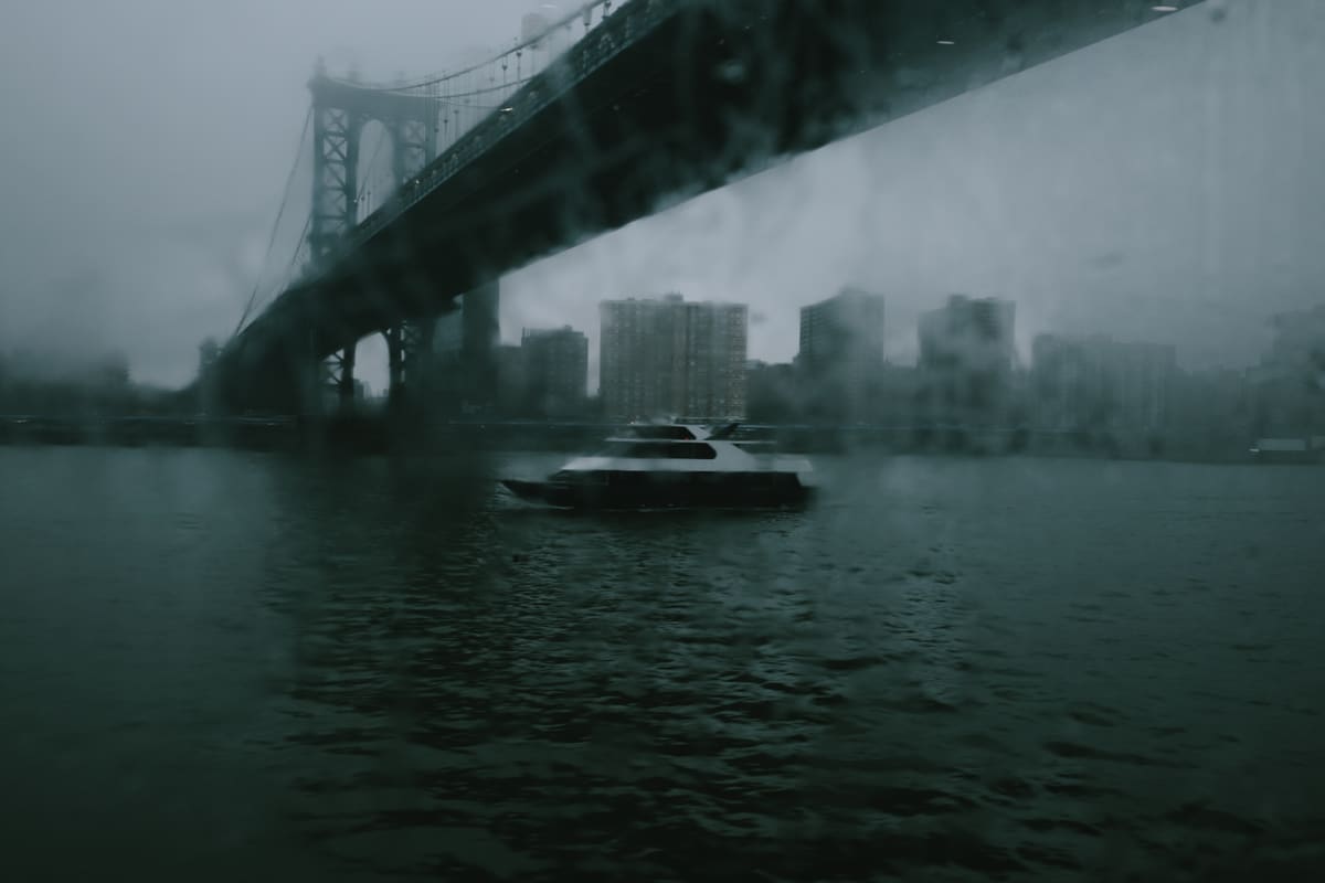 Bridge in the rain, shot from a ferry